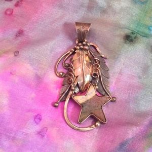 Sterling silver pendant with agate star